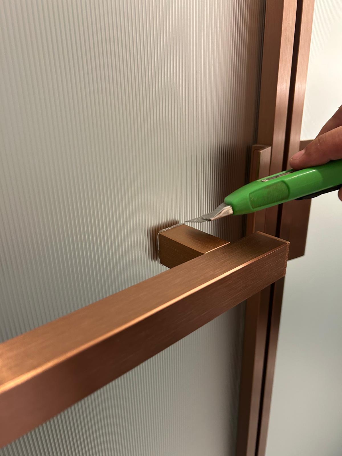 Beschlagdetail in Kupfer